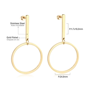 Detail view of gold-plated stainless steel earrings with rectangle and circle geometry