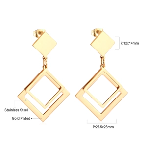 Macro view of geometric diamond-shaped earrings in gold plated stainless steel