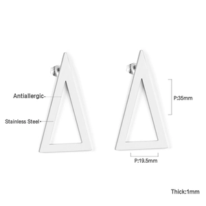 Macro detail of silver geometric triangle earrings in polished stainless steel
