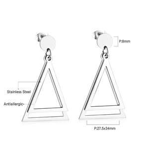 Detail of geometric double triangle earrings in polished hypoallergenic stainless steel