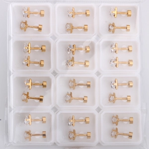 Batch of twelve pairs of gold stainless steel stud earrings with clear round zirconia
