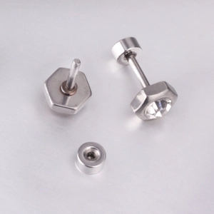 Detailed macro view of silver hexagonal stud earrings with round cubic zirconia and screw back