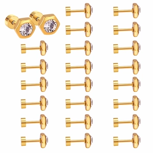 Detailed macro of gold hexagonal screw earrings featuring clear cubic zirconia stones