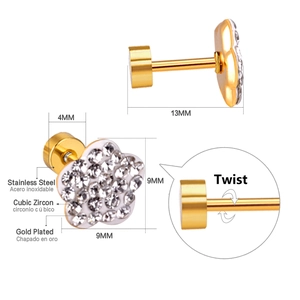 Detail of gold plated stainless steel flower stud earring with white cubic zirconia crystals