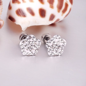 Macro detail of floral stud earrings with sparkling crystals and secure screw-back posts