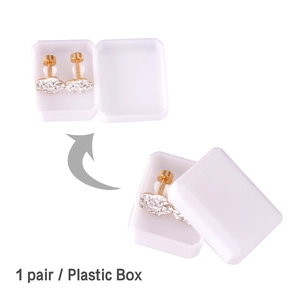 Detail view of flower-shaped gold stud earrings with cubic zirconia and plastic gift box