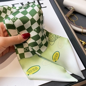Green and white checkered Twilly silk scarf with yellow NICE lettering and smiley pattern