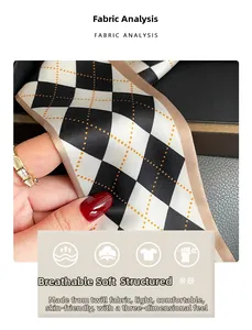 Detailed close-up showing the twill texture and diamond pattern of the narrow silk scarf