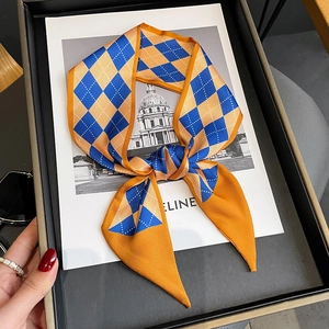 Elegant diamond-patterned narrow silk scarf in royal blue and orange twilly style