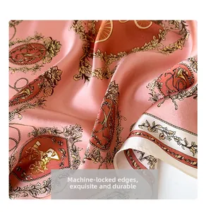 Detail of machine-hemmed edges on a vintage silk scarf with elegant carriage pattern