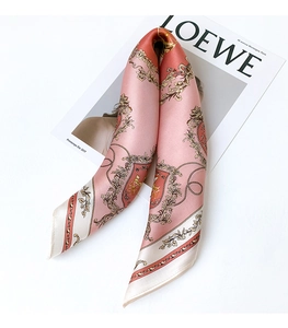 Close-up of silk scarf with vintage palace patterns on fashion magazine background