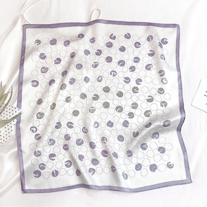 Elegant white silk scarf with purple polka dot abstract patterns and border detail