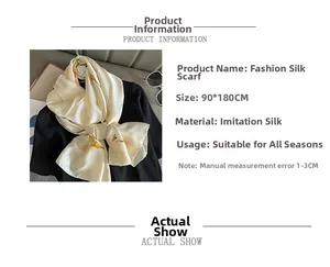 Detail view of 90x180cm faux silk scarf with yellow floral prints on cream base