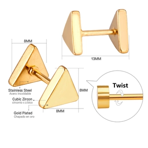 Macro detail of gold-plated triangle stud earrings with cubic zirconia and screw back