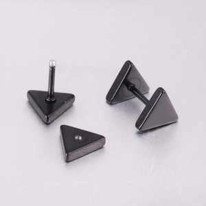 Macro shot of black stainless steel triangle earrings showing secure screw-back closure details