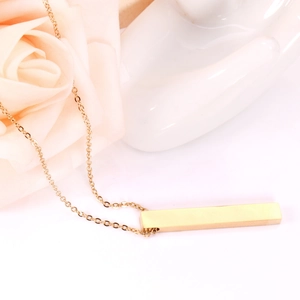 Minimalist gold bar pendant necklace with sleek stainless steel chain on display