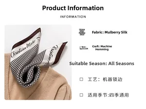 Detail view showing 53x53cm mulberry silk scarf with houndstooth print and machine hemming