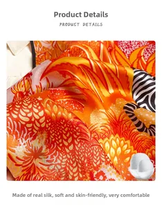 Detail shot of Mulberry silk scarf showing vibrant orange zebra patterns and soft texture