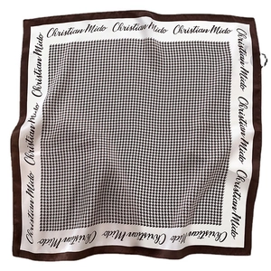 Brown houndstooth silk scarf with white border and Christian Mido elegant lettering