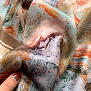 Artistic oil painting style silk scarf with vibrant orange and blue impressionist print