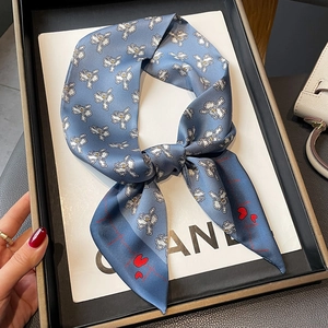 Blue-grey silk scarf with white iris flowers and red heart pulse pattern on satin fabric