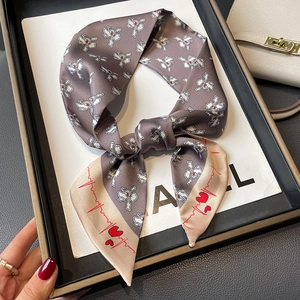 Gray-purple bunny print twilly scarf with spliced heart pattern tied in a bow