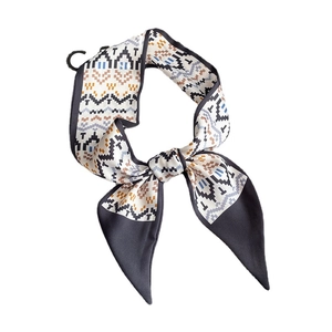 Elegant narrow silk twilly scarf with vintage pixelated geometric patterns on white background