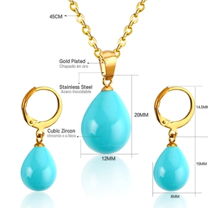 Detailed view of gold plated stainless steel necklace and teardrop zircon earring set