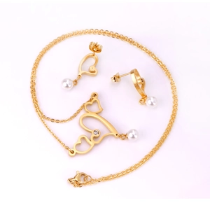 Golden heart-shaped jewelry set with necklace and pearl drop earrings for women