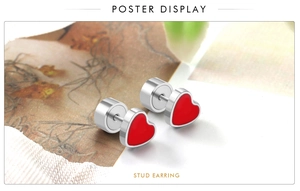 Detailed view of red heart stud earrings with silver-tone stainless steel push-back closure