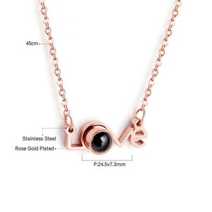 Detail of rose gold plated LOVE pendant with projection stone and size measurements