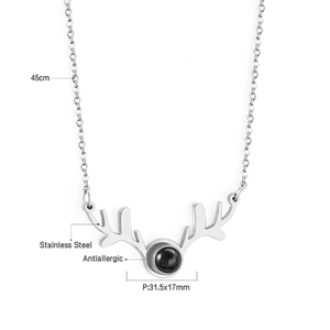 Detailed view of silver antler heart necklace with size specs and 45cm chain length