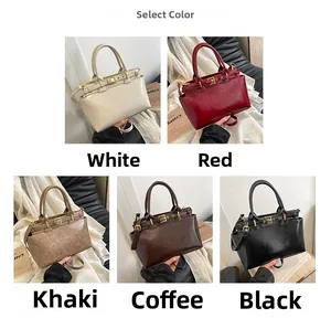 Detailed view of the five color options for this vintage tote bag with top handle and strap