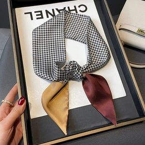 Fashionable twilly scarf featuring geometric houndstooth print and colorful silk panels