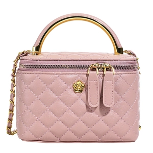 Pale pink quilted leather box bag with gold handle and chain strap on white background