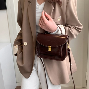 Elegant British style dark red crossbody bag with glossy leather and gold hardware
