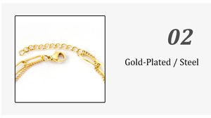 Detail of 18K gold-plated double-layer paperclip chain bracelet with a lobster clasp