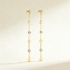 Boucles d'oreilles pendantes étoiles dorées avec strass brillants au style minimaliste
