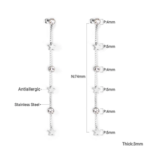 Détail montrant les dimensions des boucles d'oreilles étoiles en acier avec mesures