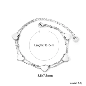 Detailed view of silver double-layered stainless steel heart bracelet with lobster clasp
