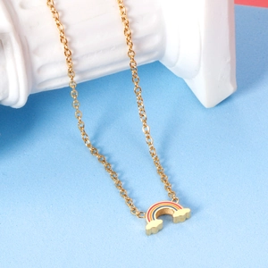 Detailed close-up of rainbow cloud pendant on gold stainless steel curb chain