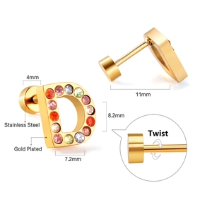 Macro view of gold-plated stainless steel D-letter stud earring with multi-color crystals