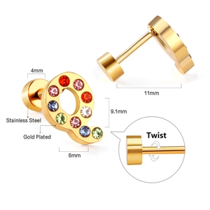 Macro shot of gold plated stainless steel letter Q stud earring with colorful crystals