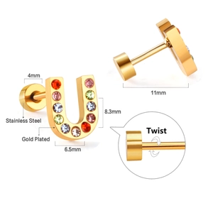 Detail of gold-plated stainless steel letter U stud with multicolored crystals and screw back