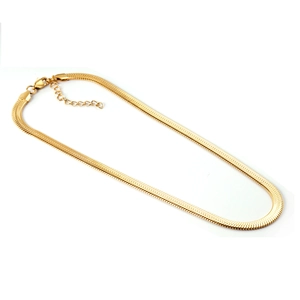 Close-up of golden herringbone chain featuring a lobster clasp and extension link