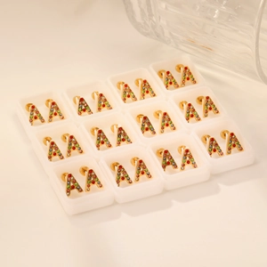 Golden letter A stud earrings set with colorful rhinestones in a white display box