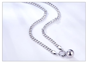 Polished silver stainless steel ball pendant with a flat Cuban chain link necklace