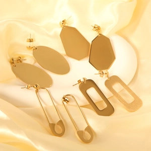 Minimalist gold geometric earring set featuring polished oval, hexagonal and U-shaped designs