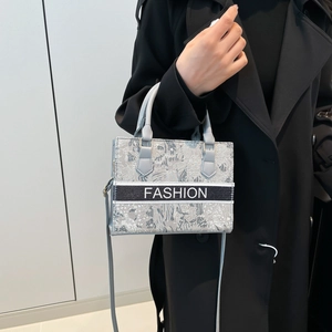 Grey embroidered jacquard handbag with fashion lettering and versatile shoulder strap