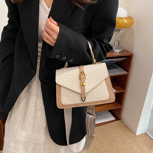 Fashion woven stone texture handbag for women in beige and cream with gold buckle accent